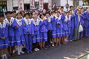 School children lining the rally route